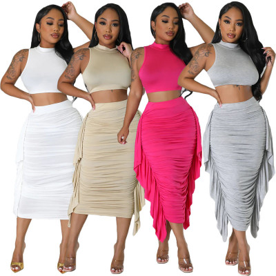 Women's solid color high waisted ruffled edge with exposed navel tight vest skirt set