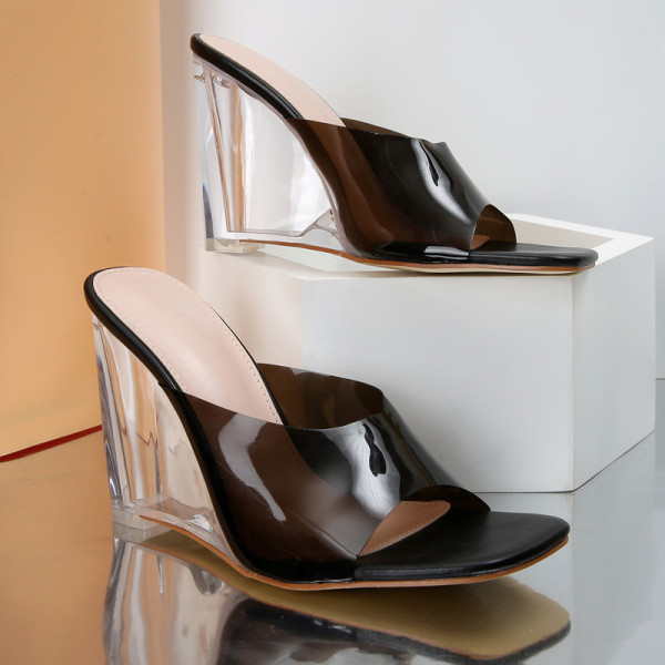 Wearing thick heeled transparent PVC wide band sandals and slippers on the outside with high heels