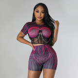 Two piece stylish digital printed round neck top paired with slim fitting shorts