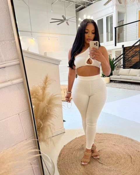 Solid color diagonal shoulder hollowed out tank top and pants sports two-piece set