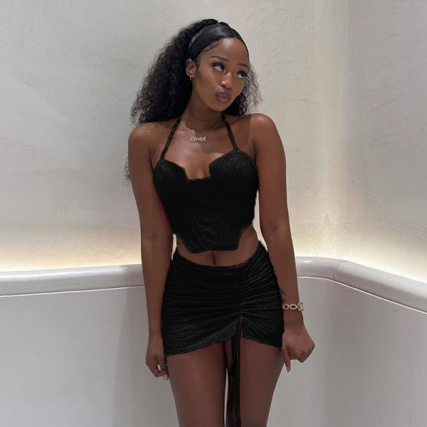 Solid lace hollowed out suspender with irregular navel wrap and high waisted drawstring pleated skirt two-piece set