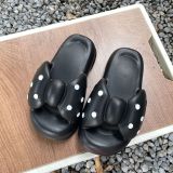 EVA bowknot slippers with thick soles and a cool feeling of stepping on feces