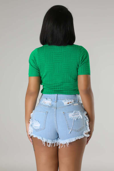 Fashionable perforated irregular denim shorts