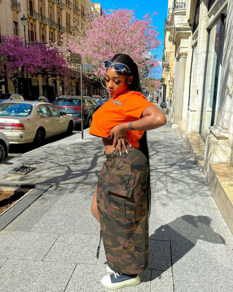 Women's fashion camouflage wash pocket with slit tassel eyelet strap skirt