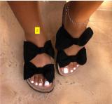 Oversized bow sandals and slippers