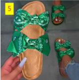 Oversized bow sandals and slippers