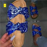 Oversized bow sandals and slippers