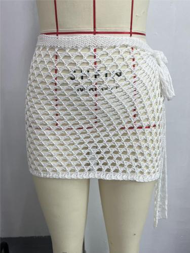 Women's sexy knitted texture hollowed out holiday perspective one piece short beach skirt