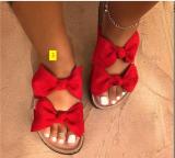 Oversized bow sandals and slippers