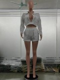 Solid color long sleeved pocket pullover white shorts set