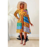 Women's printed long sleeved button up mid length dress
