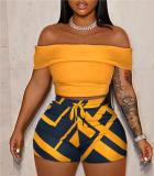 Off shoulder top with contrasting printed short pants set