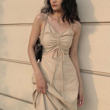 Fashionable slim fitting solid color casual long dress for women with sexy drawstring hollow out suspender dress