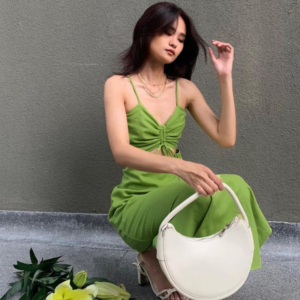 Fashionable slim fitting solid color casual long dress for women with sexy drawstring hollow out suspender dress