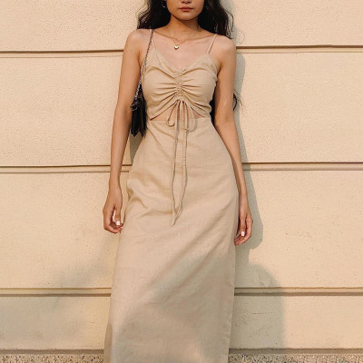 Fashionable slim fitting solid color casual long dress for women with sexy drawstring hollow out suspender dress