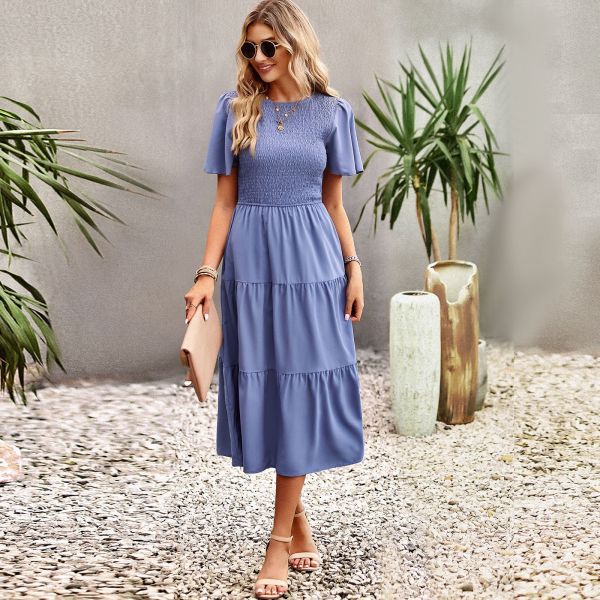 Large swing dress with round neck and holiday skirt