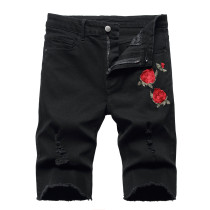Denim shorts with elastic holes and ground edges Denim shorts with elastic holes and ground edges