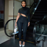 Tight solid colored irregular navel exposed jumpsuit pants