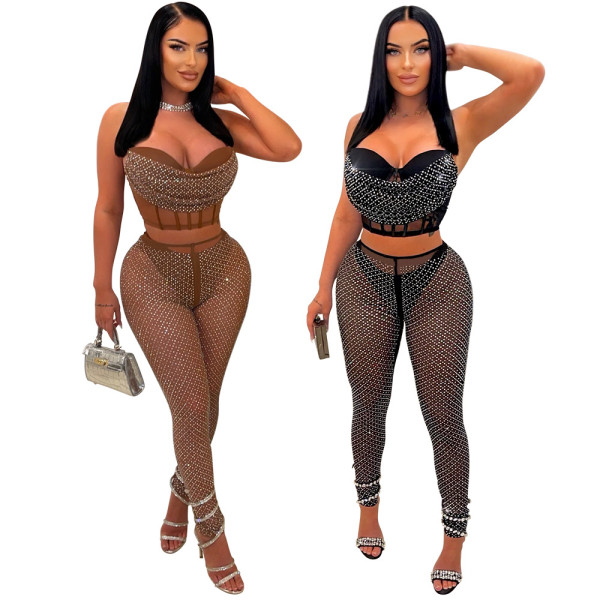 Sleeveless suspender top with slim fitting pencil pants and hot diamond set