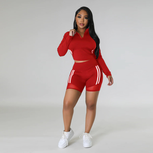 Casual long sleeved top paired with fashionable hip lifting shorts casual set