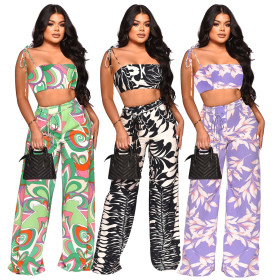 Two piece set of printed holiday style suspender wrap chest wide leg pants