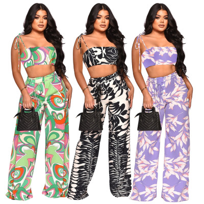 Two piece set of printed holiday style suspender wrap chest wide leg pants