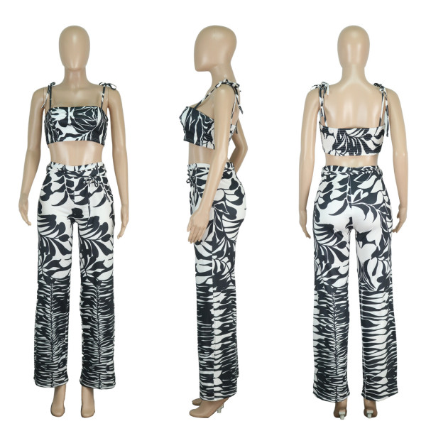 Two piece set of printed holiday style suspender wrap chest wide leg pants