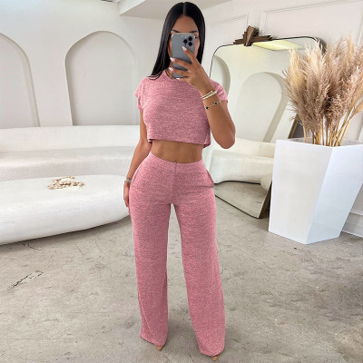 Fashionable loose fitting short sleeved shirt and pants casual set with exposed navel