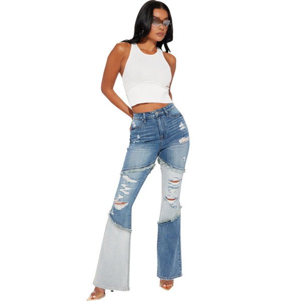 Sexy and fashionable versatile tassel pierced elastic slim flared pants