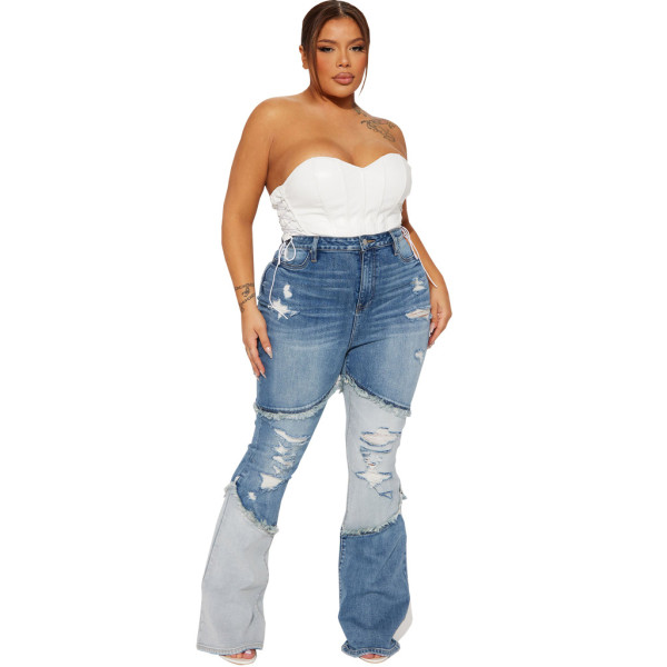 Sexy and fashionable versatile tassel pierced elastic slim flared pants