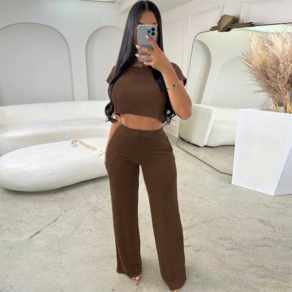 Fashionable loose fitting short sleeved shirt and pants casual set with exposed navel