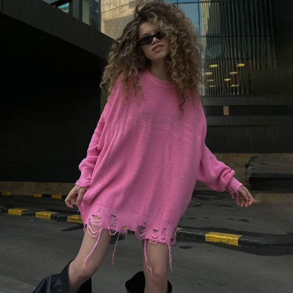 Wearing a loose and versatile female sweater with handmade frayed tassel long sleeved top