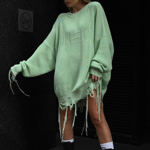 Wearing a loose and versatile female sweater with handmade frayed tassel long sleeved top