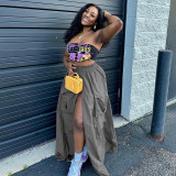 Solid woven high waisted elastic stitching with multiple pockets, loose fit, oversized work style A-line half length skirt
