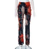 Fashionable tassels with holes and tight casual pants