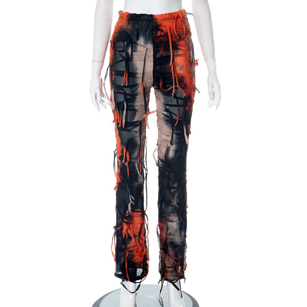 Fashionable tassels with holes and tight casual pants