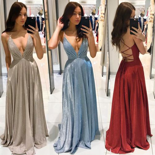 Slim fitting long dress with strap and open back