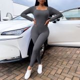 Solid color neck hanging long sleeved jumpsuit