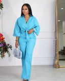Solid color strapped button cardigan with loose shoulder sleeves casual set