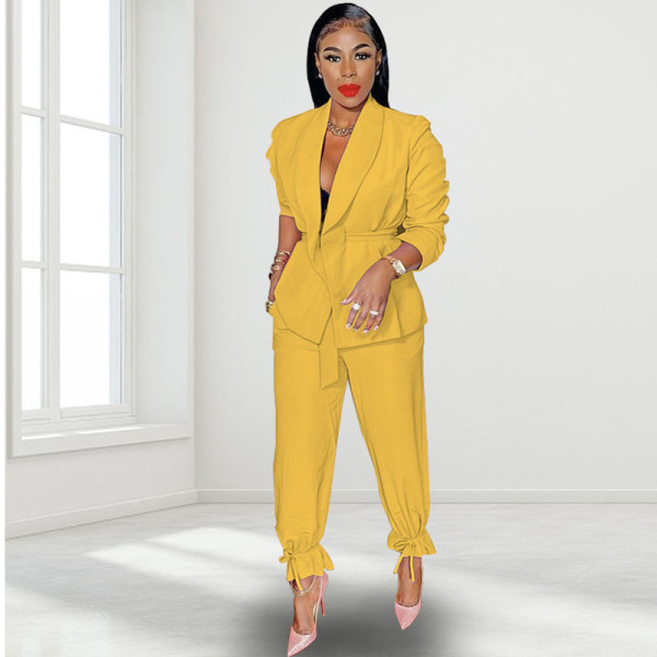 Solid color strapping long sleeved small suit top and leggings set