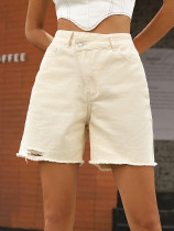 High waisted loose fitting and slimming denim shorts with raw edges