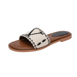 Embroidered flat bottomed slippers