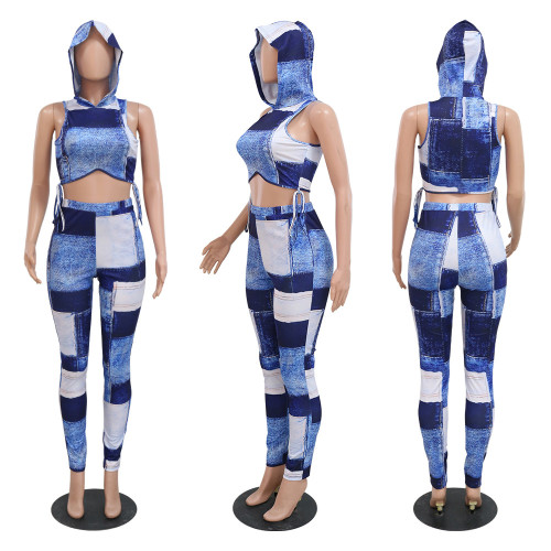 Sleeveless top paired with slim fitting pencil pants