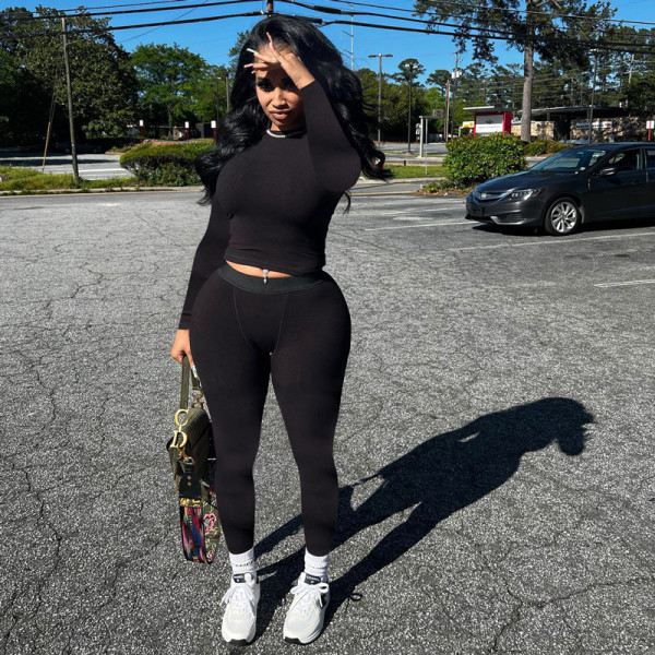 Tight fitting long sleeved one piece top and pants sports casual set