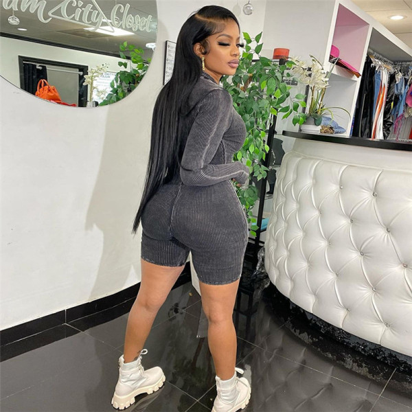 Long sleeved contrast colored high neck high waist tight short jumpsuit