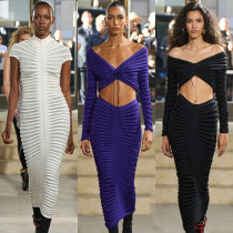 Long sleeved wrap chest spicy girl top half skirt knit set