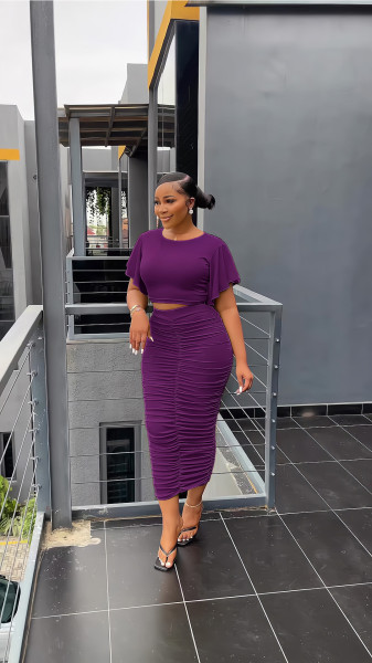 Two piece ruffled short sleeved pleated hip wrap skirt set