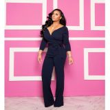 Long sleeved solid V-neck tight jumpsuit