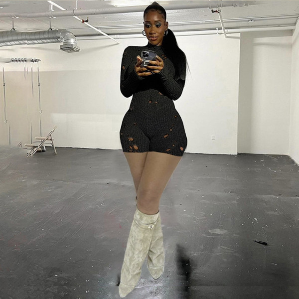 Hollow and perforated knitted high waisted tight wrap buttocks long sleeved jumpsuit