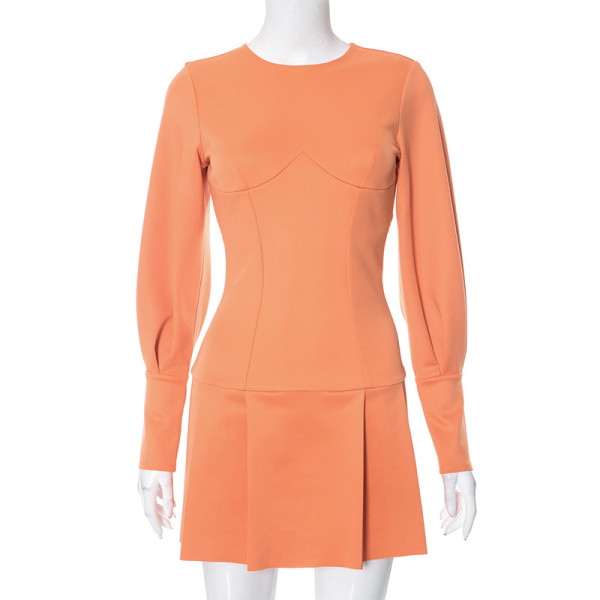 Long sleeved dress with open back mini skirt